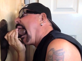 Gloryhole lover blowing black cock prior to riding dick