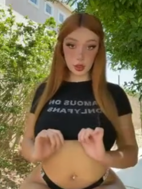 Smoking hot thick redhead with big boobs!