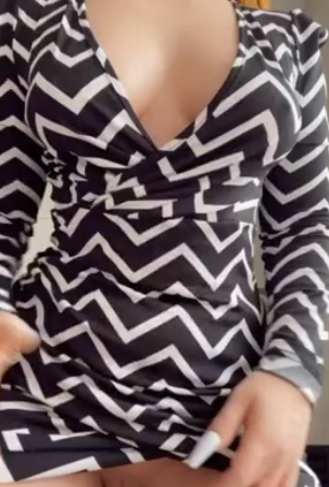 Perky nipples under a skin tight dress