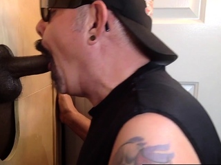 Mature DILF blows black gloryhole dick prior to barebacked