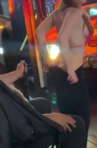 Redhead gives a lap dance to a stranger at the bus stop!