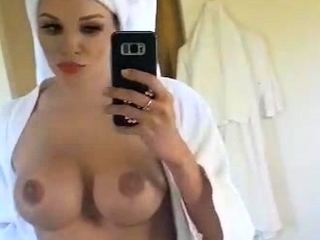 Glamour babe with massive boobs masturbates in lingerie