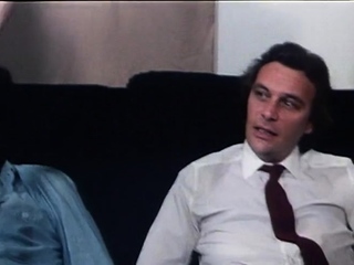 The brunette with massive boobs does a hand job and blowjob