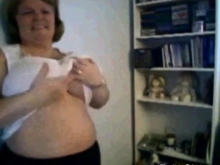 Mature Nancy playing with her boobs on webcam