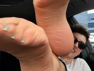 Cute teen girl enjoys foot fetish