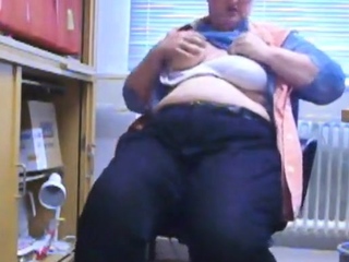 Office girl teases in her office