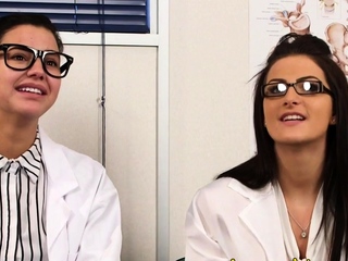 Clothed nurses mocking naked patient