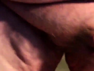 Fat boys tiny penis being pushed around while standing up.