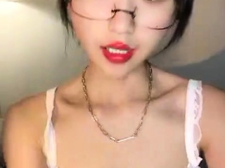 Busty Japanese babe in lingerie has her pussy licked out