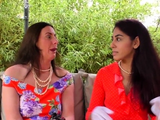 Stockinged milf licking lesbian