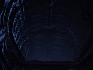 A sexy hottie gets fucked by a female alien in a cave