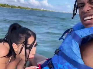 Brunette gives mass blowjob outdoors