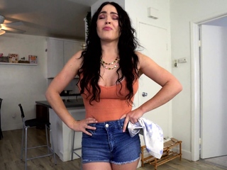 Brunette seductress working her big boobs and hot ass