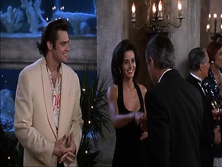 Courteney Cox busts out big cleavage in sexy little black