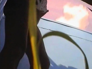 Hidden camera films a gal in a changing room putting on her