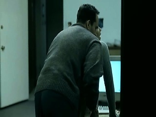 Maria Bello lying naked on a bed,her hands bound above her