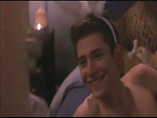 Monet Mazur shown topless during a love scene with a guy in