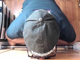 Mature DILF deepthroats and slurps on gloryhole dong