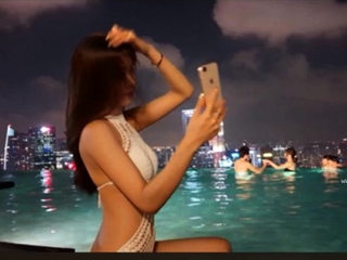 Teen brunette in black stockings plays with cunt