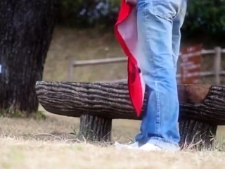 A young gay having a good wank in public