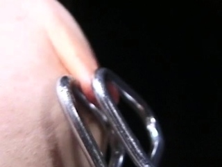 Adorable maid is playing with love beads