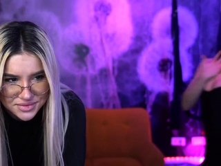 Blonde and brunette teens tug a hard cock