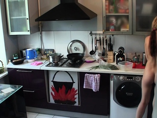 Teasing teen cooks naked