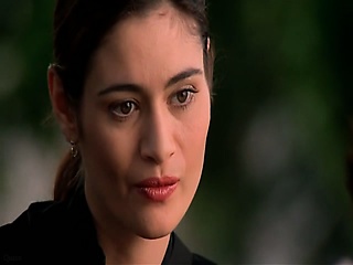 Alyssa Milano posing topless for Charlotte Lewis, who takes