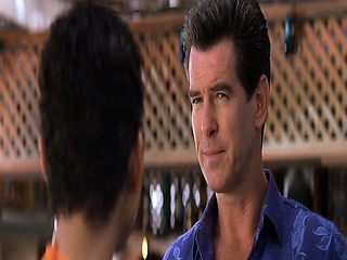 Halle Berry wearing a sexy orange bikini as she rises out