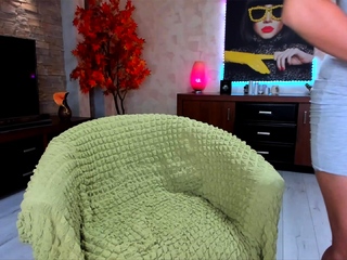 Busty curly brunette with big boobs fucks on couch