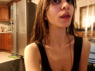 Redhead teen chick toys pussy in the jacuzzi