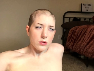 Redheaded amateur MILF with a sex toy on webcam show