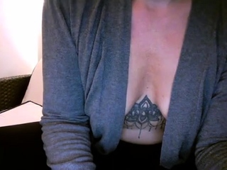 Turned on mature lady masturbating with panties and toys