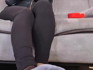 Petite redhead enjoys foot fetish session