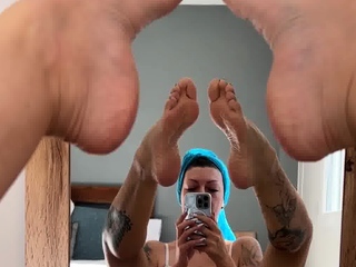 Pink labia close up of naive brunette playing with her name