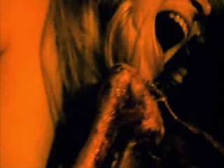 Sheri Moon appropriately pulling down her pants to reveal