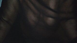 A girl in a brothel in Dubai is sitting naked