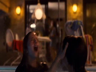 Kristen Stewart looking hot while swimming in the pool,