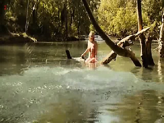 Ludivine Sagnier fully nude as she jumps into a river and
