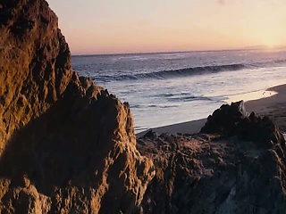 Brooklyn Decker breasts bouncing in a low-cut blue top as