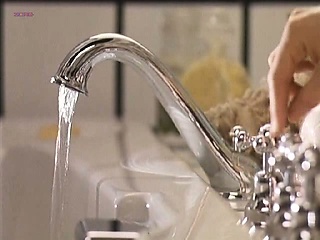 Charlotte Lewis topless and in dominatrix lingerie showing