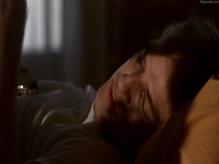 Maria Schneider making out with a guy in an empty