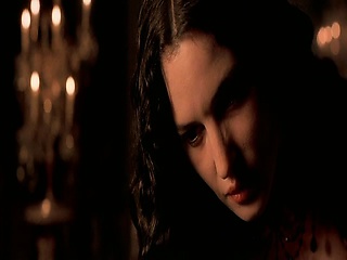 Monica Bellucci riding the guy on a bed, her bare butt