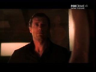 Odette Yustman of Cloverfield fame undressing in an