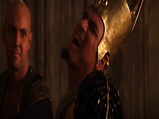 Patricia Velasquez wearing body paint with gold pasties