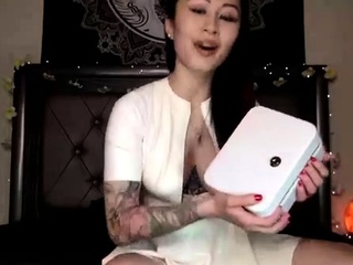 Asian babe sucking and jerking two hard dicks