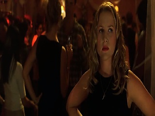 Denise Richards looking sexy in a black bikini as she