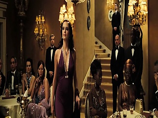 Eva Green leaning over into the passenger side door of a