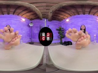 Oiled feet in close up