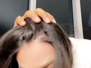 A super sexy brunette massages her big boobs